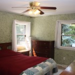 Large, quiet, well balanced fan is mounted directly over bed