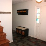 Hallway leads to large rec-room
